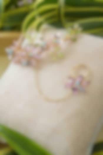 Gold Finish White Gemstone & Resin Floral Hathphool (Set of 2) by FLORISTAA BY MAHEK at Pernia's Pop Up Shop