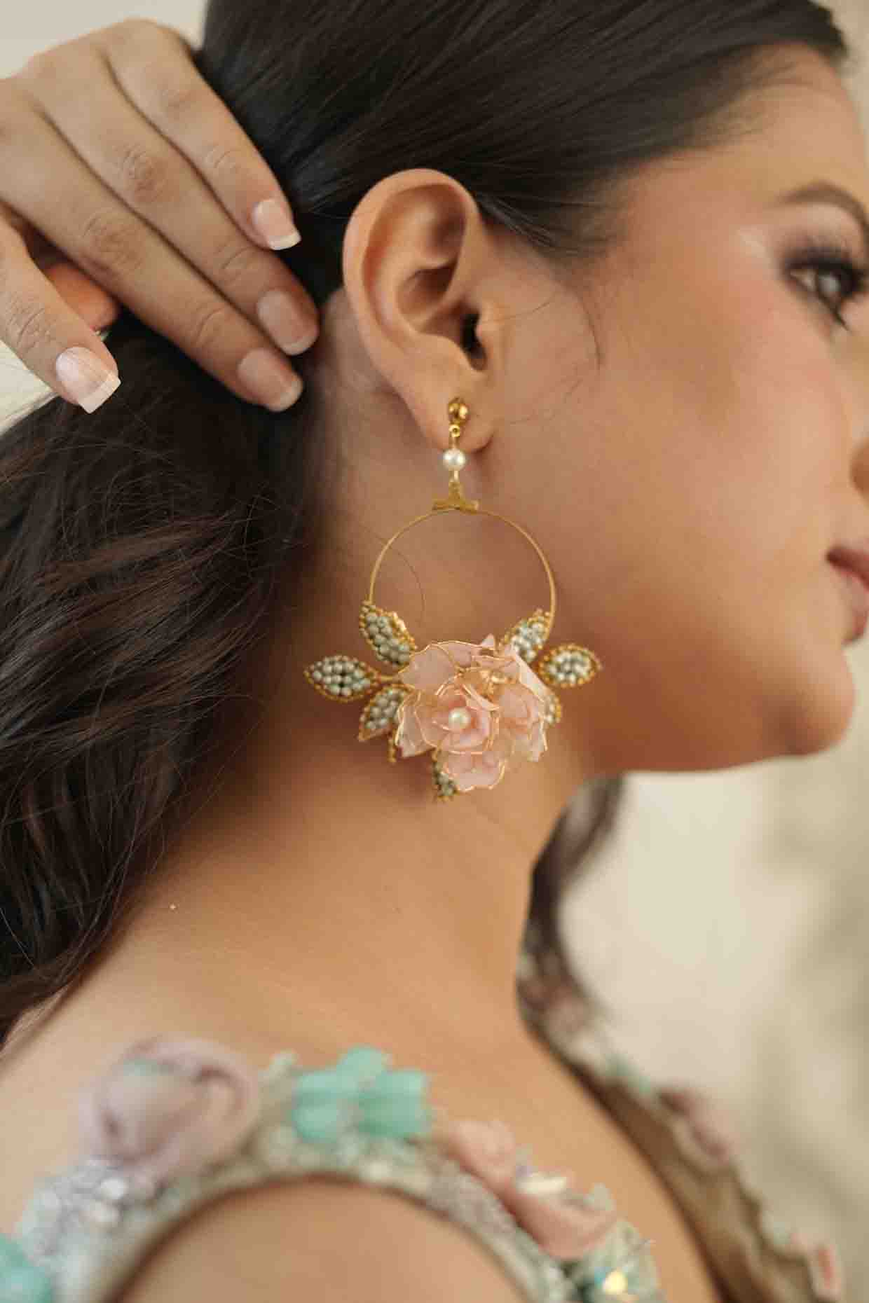 Gold Finish Pink Gemstone & Resin Floral Earrings by FLORISTAA BY MAHEK at Pernia's Pop Up Shop