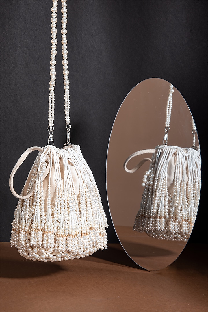 White Handcrafted Potli by Forever Noor at Pernia's Pop Up Shop