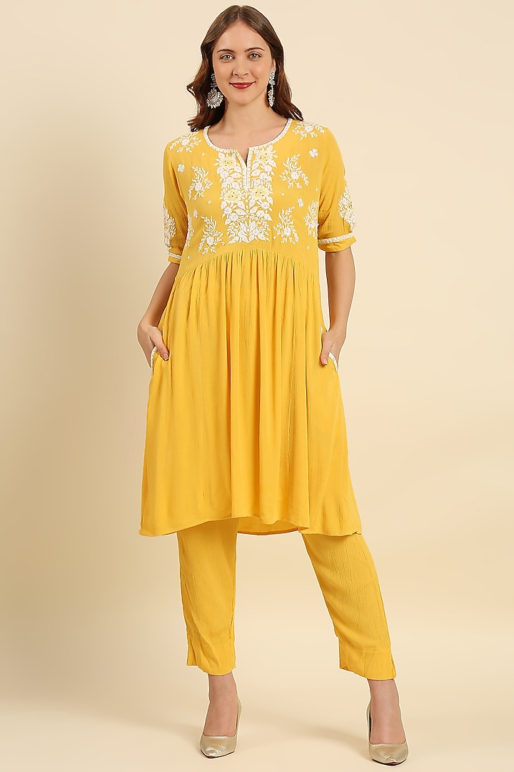 Yellow Crepe Wrinkle Woven Kurta Set by ILAPTI at Pernia's Pop Up Shop