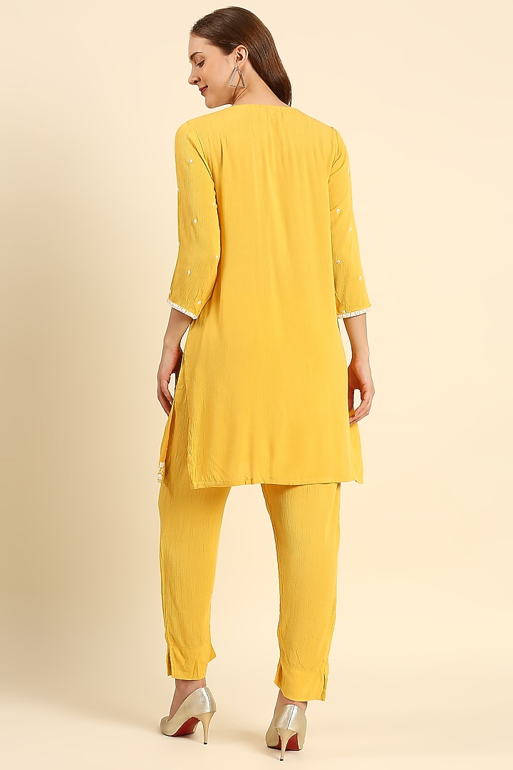Yellow Crepe Woven Kurta Set by ILAPTI at Pernia's Pop Up Shop