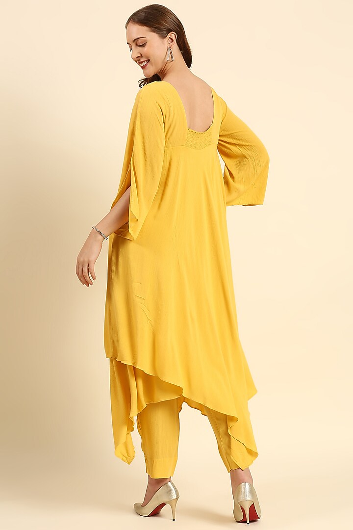 Yellow Crepe Asymmetrical Kurta Set by ILAPTI at Pernia's Pop Up Shop