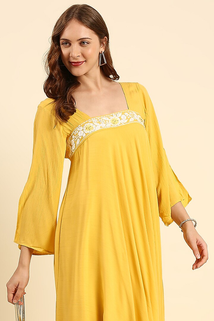 Yellow Crepe Asymmetrical Kurta Set by ILAPTI at Pernia's Pop Up Shop