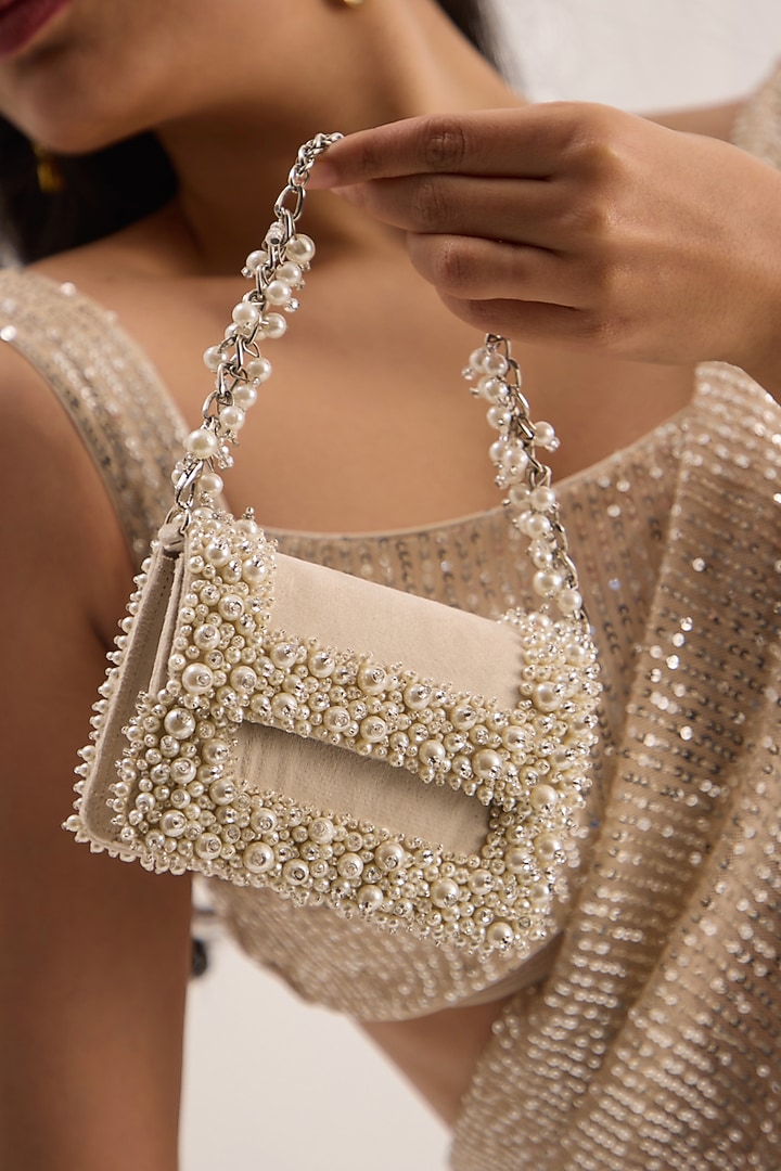 Ivory Suede Pearl Mini Clutch by Forever Noor at Pernia's Pop Up Shop