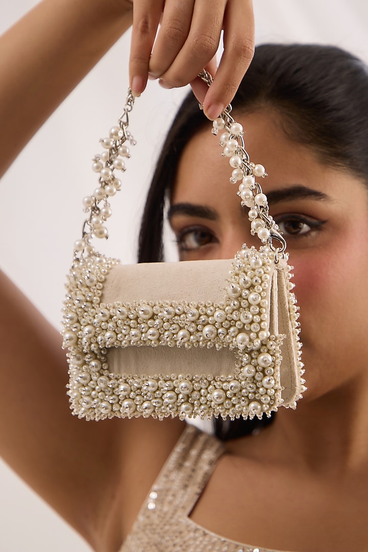 Ivory Suede Pearl Mini Clutch by Forever Noor at Pernia's Pop Up Shop