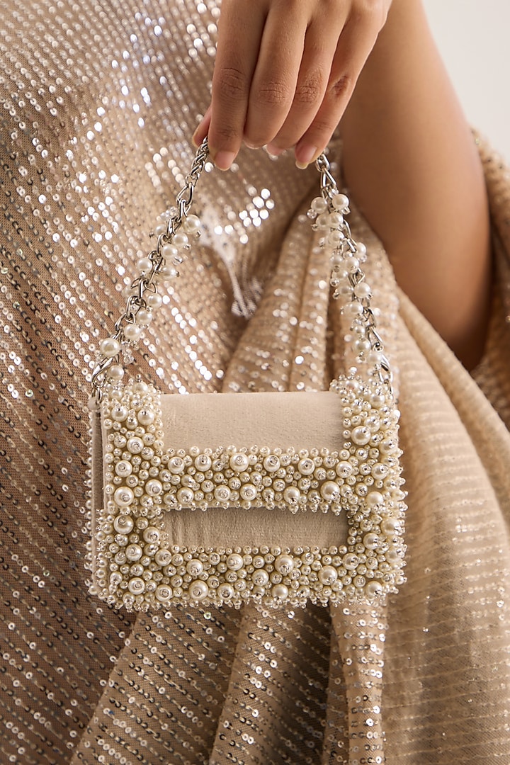 Ivory Suede Pearl Mini Clutch by Forever Noor at Pernia's Pop Up Shop