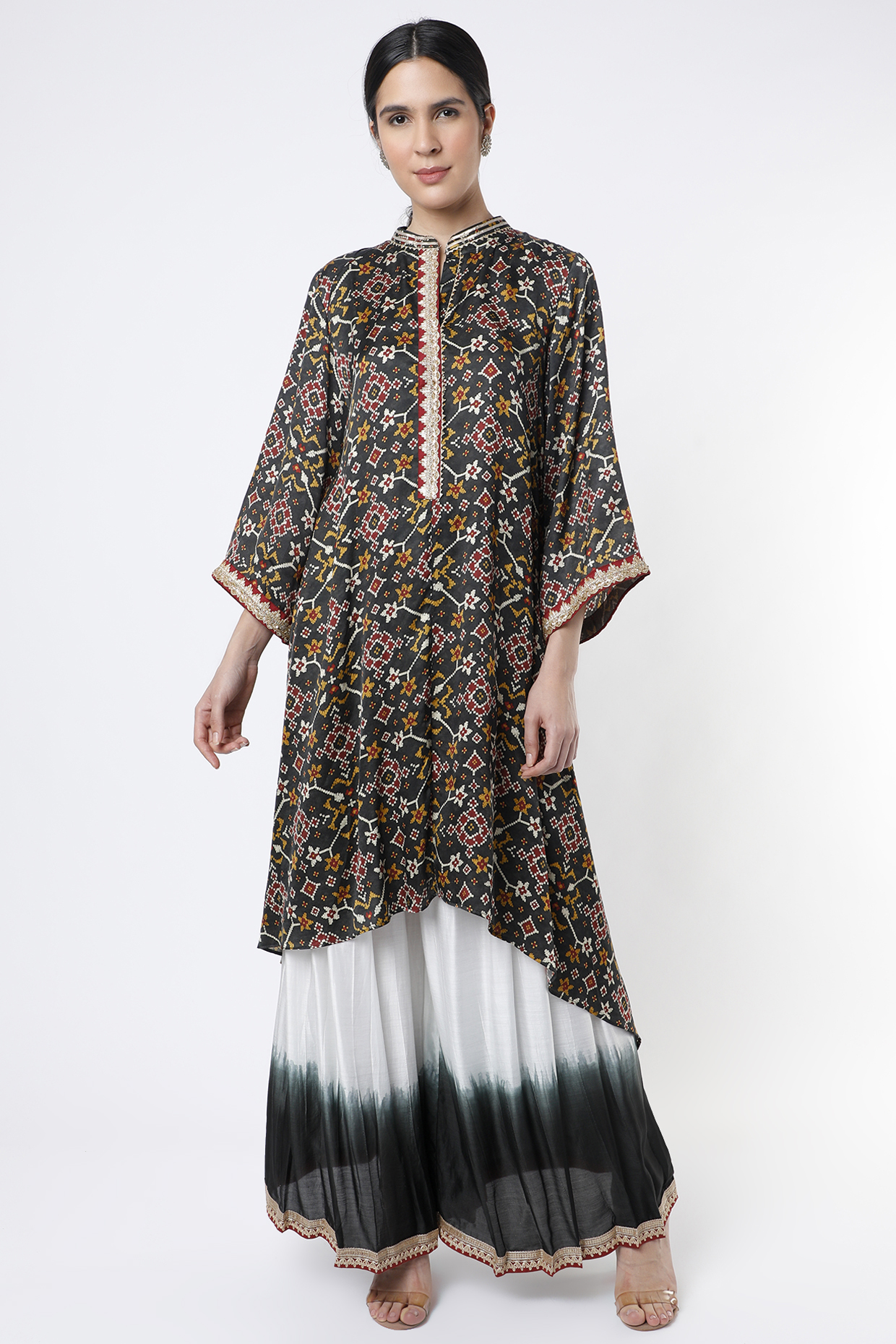 Black Muslin Satin Cross-Cut Patola Kurta by ILAPTI at Pernia's Pop Up Shop