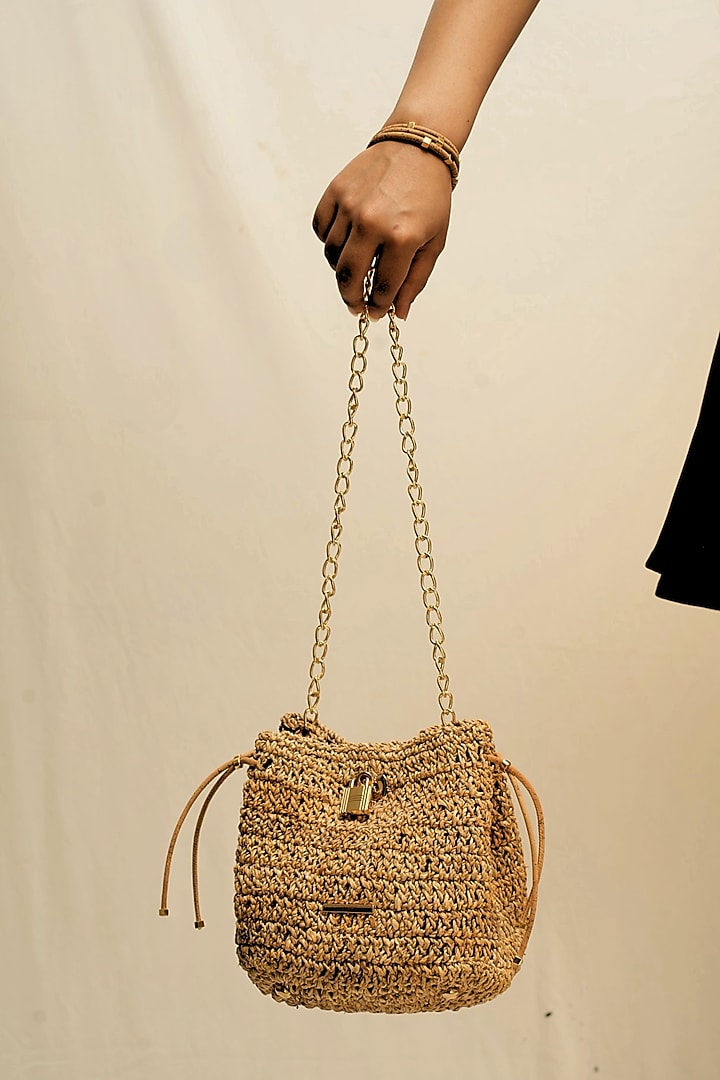Beige Banana Bark Woven Mini Bucket Bag by FORET at Pernia's Pop Up Shop