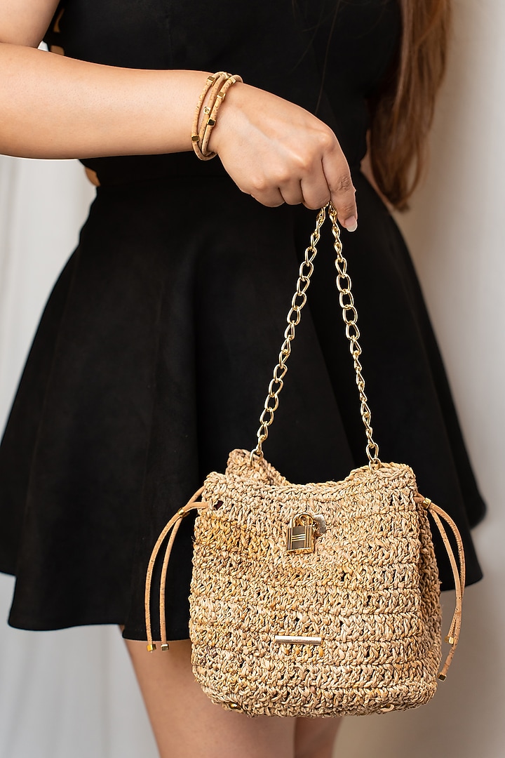 Beige Banana Bark Woven Mini Bucket Bag by FORET at Pernia's Pop Up Shop