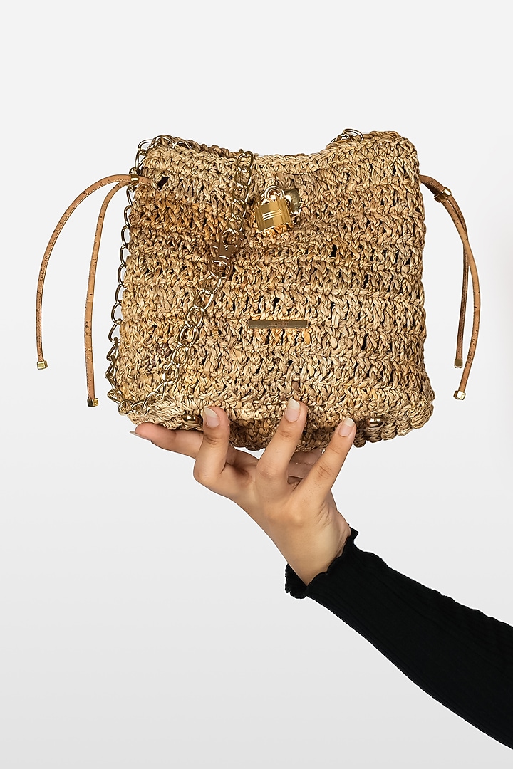 Beige Banana Bark Woven Mini Bucket Bag by FORET at Pernia's Pop Up Shop