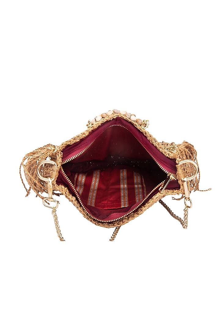 Beige Banana Bark Handcrafted Knitted Sling Bag by FORET at Pernia's Pop Up Shop