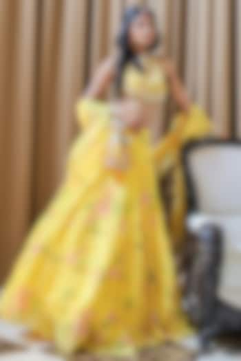 Yellow Georgette Paisley Printed Tiered Lehenga Set by Foram Patel