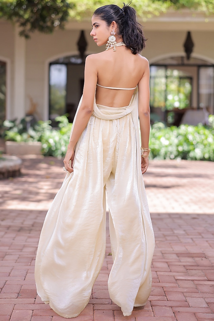 Cream Soft Shimmer Organza Pleated Jumpsuit by Foram Patel at Pernia's Pop Up Shop
