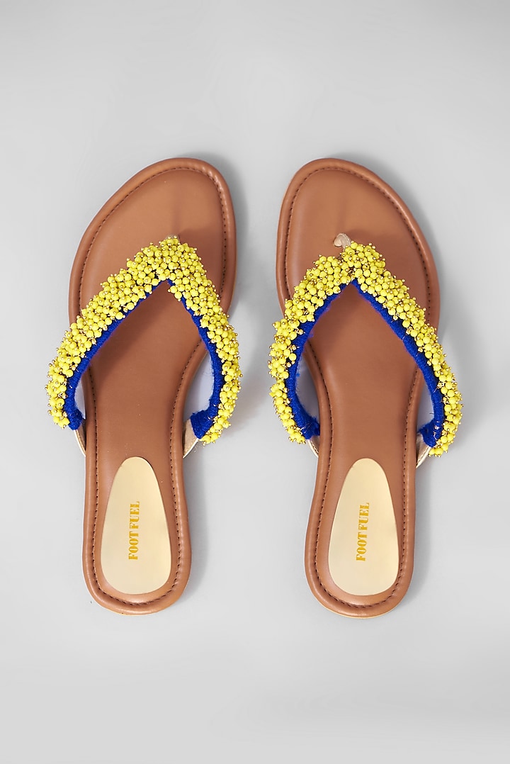 Yellow Rexine Embellished Flats by Foot Fuel