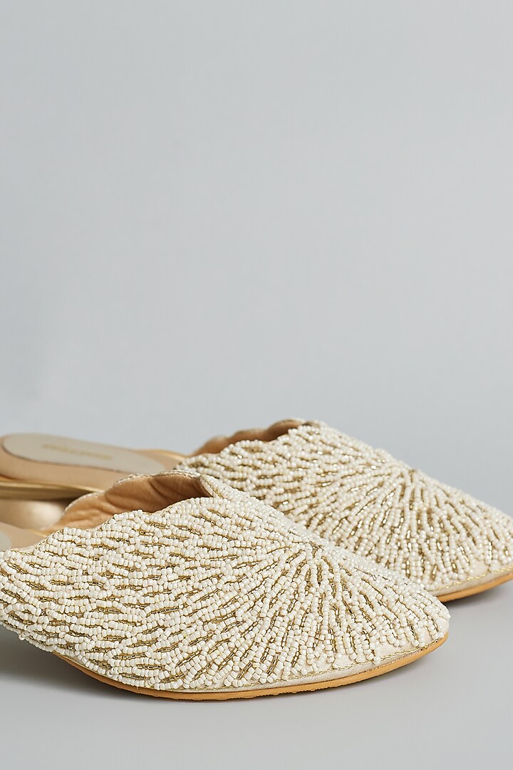 Gold Rexine Pearl & Aari Hand Embroidered Juttis by Foot Fuel at Pernia's Pop Up Shop