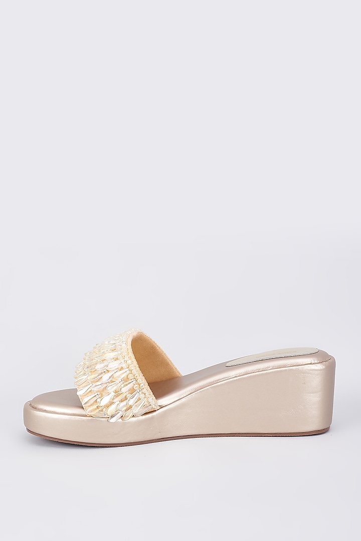 Gold Rexine Pearl Embellished Wedges by Foot Fuel at Pernia's Pop Up Shop