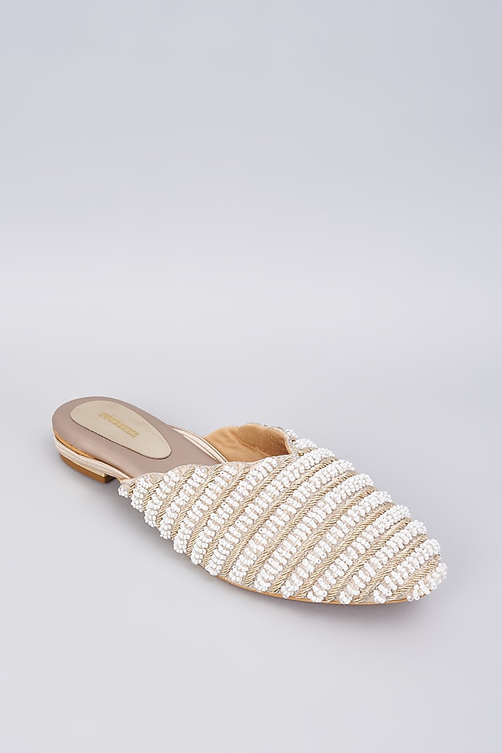 Gold Rexine Pearl Embellished Juttis by Foot Fuel at Pernia's Pop Up Shop