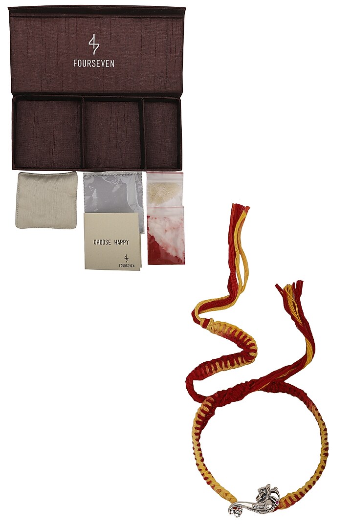 Lord ganesha brooch and moli thread rakhi set available only at Pernia's Pop Up Shop.