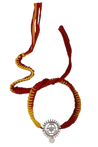 Sudarshan Chakra Brooch and Moli Thread Rakhi Set by FOURSEVEN