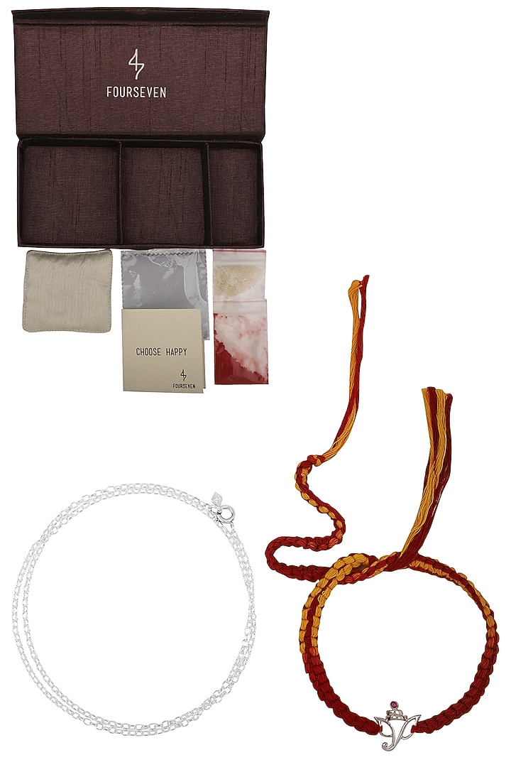 Lord ganesha pendant and moli thread rakhi set available only at Pernia's Pop Up Shop.