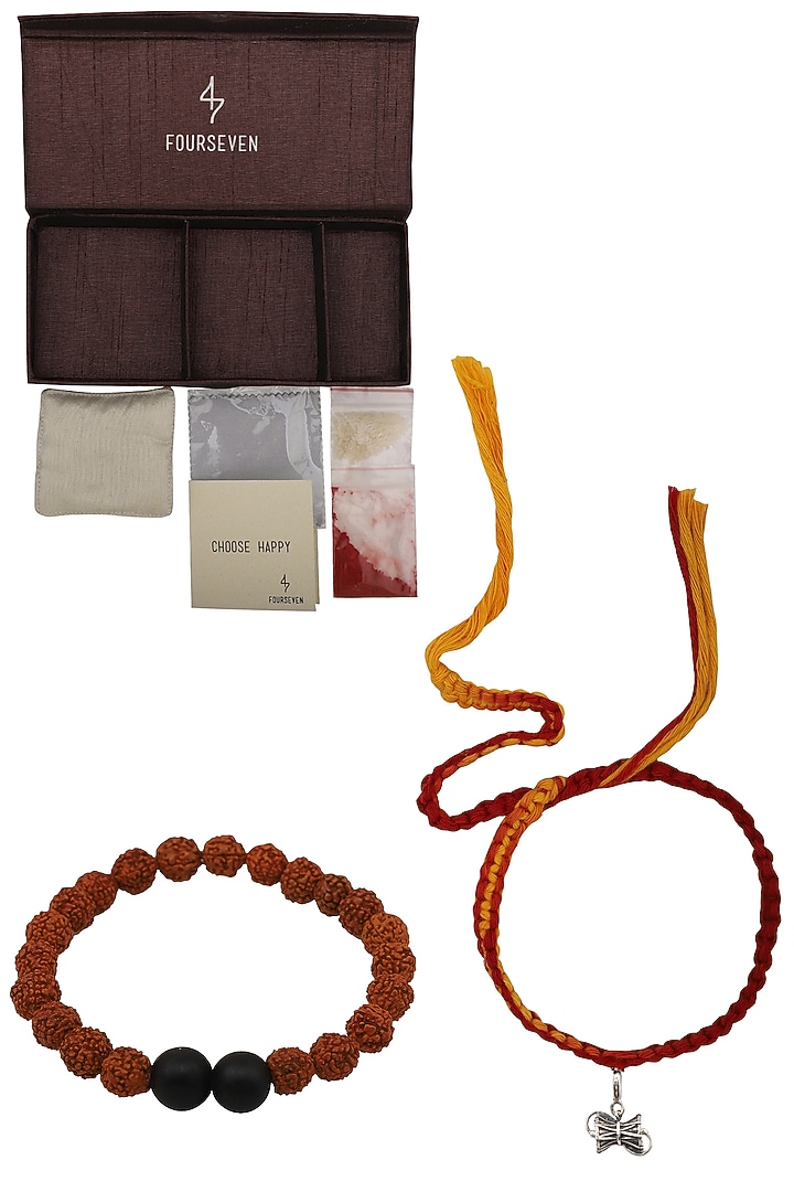 Damru charm pendant and moli thread rakhi set available only at Pernia's Pop Up Shop.