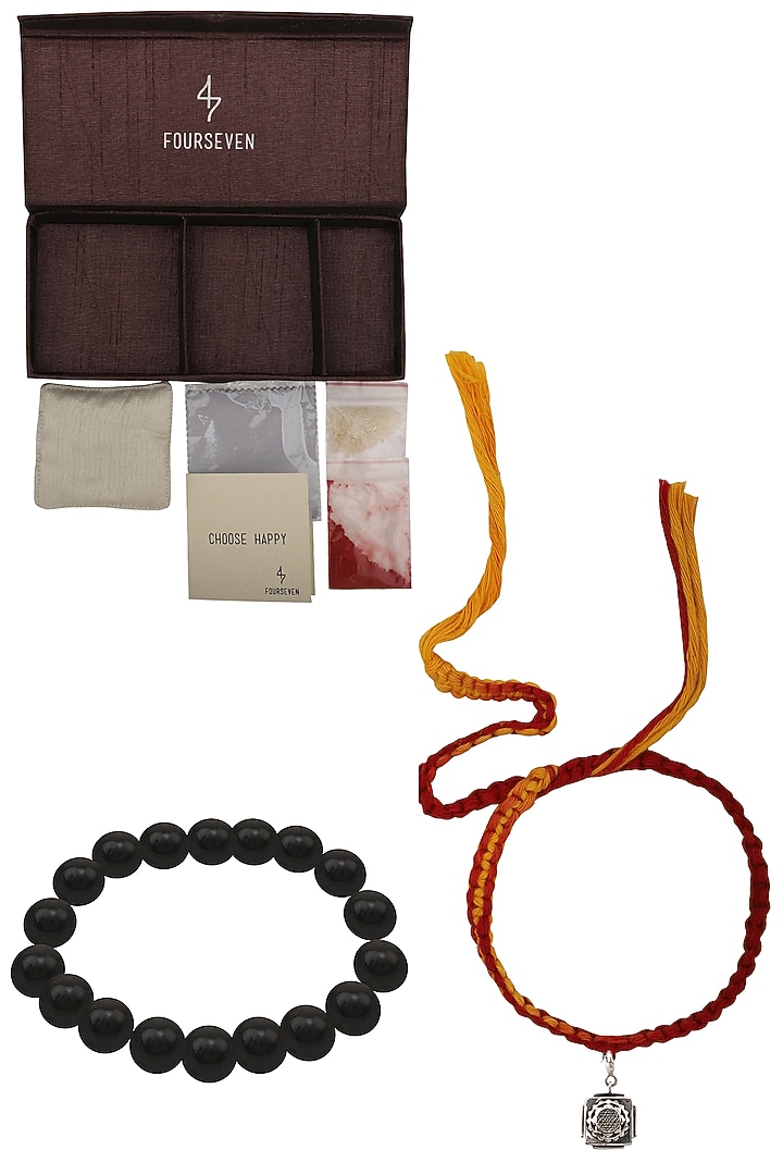 Shri yantra charm pendant and moli thread rakhi set available only at Pernia's Pop Up Shop.
