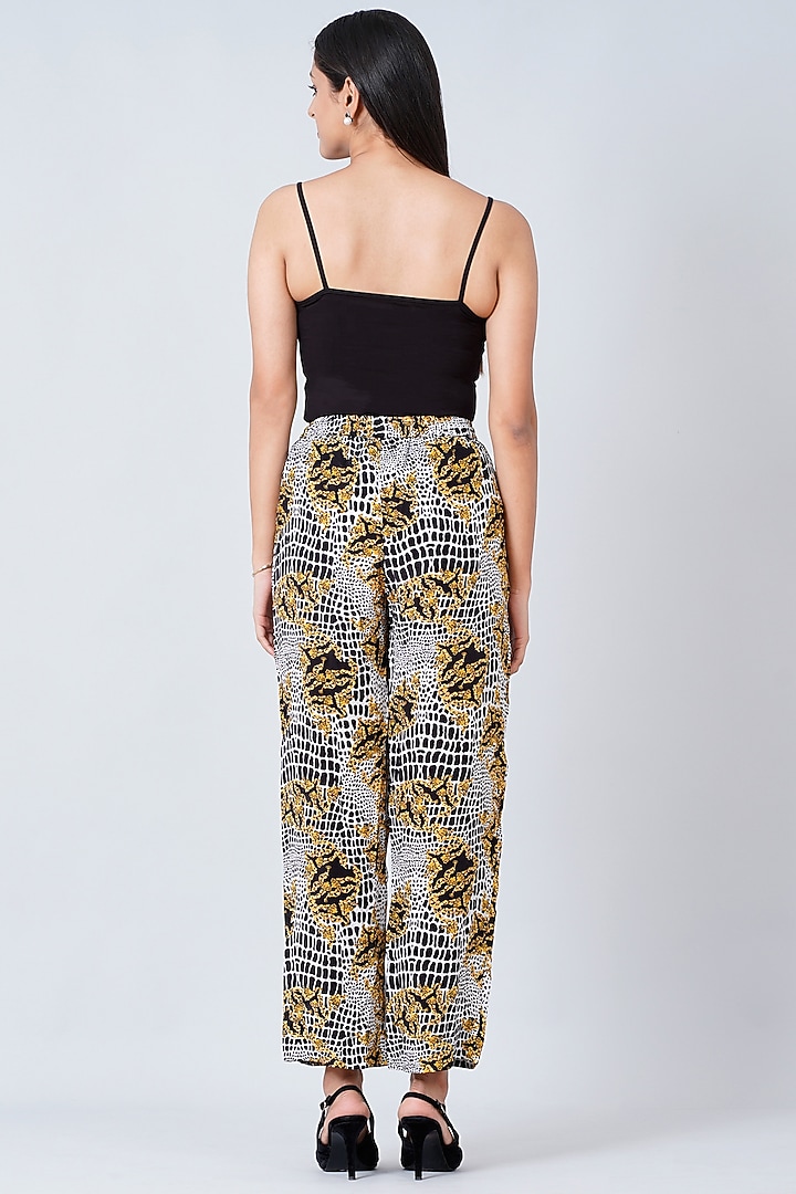 Yellow & Black Printed Palazzo Pants by First Resort by Ramola Bachchan at Pernia's Pop Up Shop