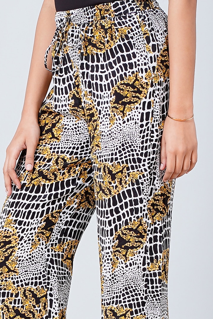 Yellow & Black Printed Palazzo Pants by First Resort by Ramola Bachchan at Pernia's Pop Up Shop