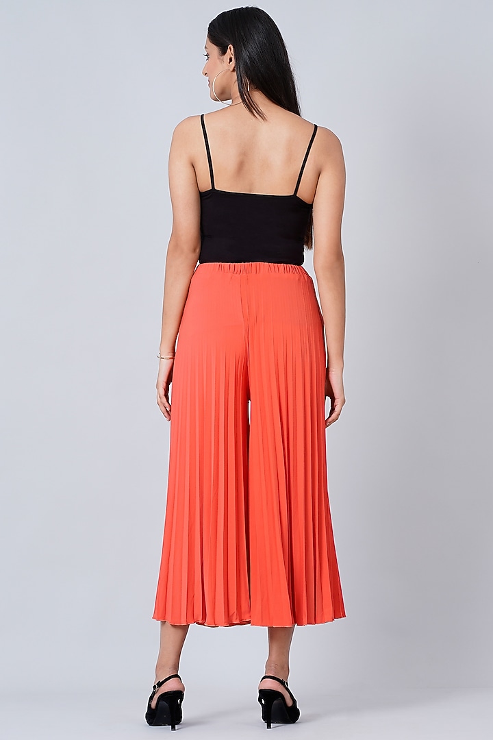 Orange Pleated Palazzo Pants by First Resort by Ramola Bachchan at Pernia's Pop Up Shop