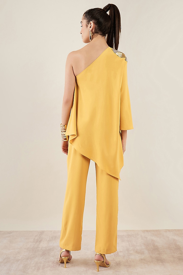 Mustard Polyester Crepe Crystal Hand Embellished One-Shoulder Asymmetric Co-Ord Set by First Resort by Ramola Bachchan at Pernia's Pop Up Shop