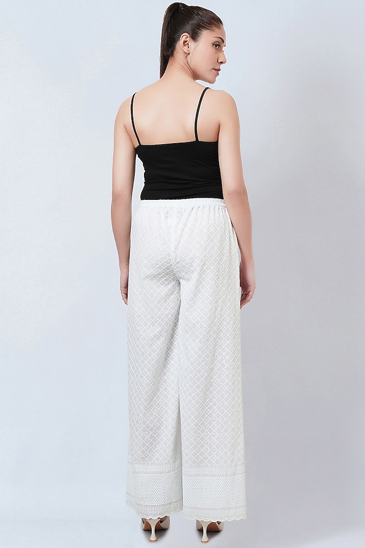 White Cotton Cambric Embroidered Pants by First Resort by Ramola Bachchan at Pernia's Pop Up Shop