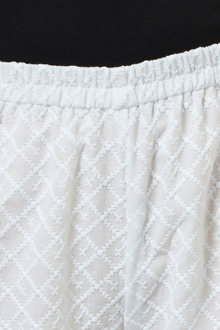 White Cotton Cambric Embroidered Pants by First Resort by Ramola Bachchan at Pernia's Pop Up Shop
