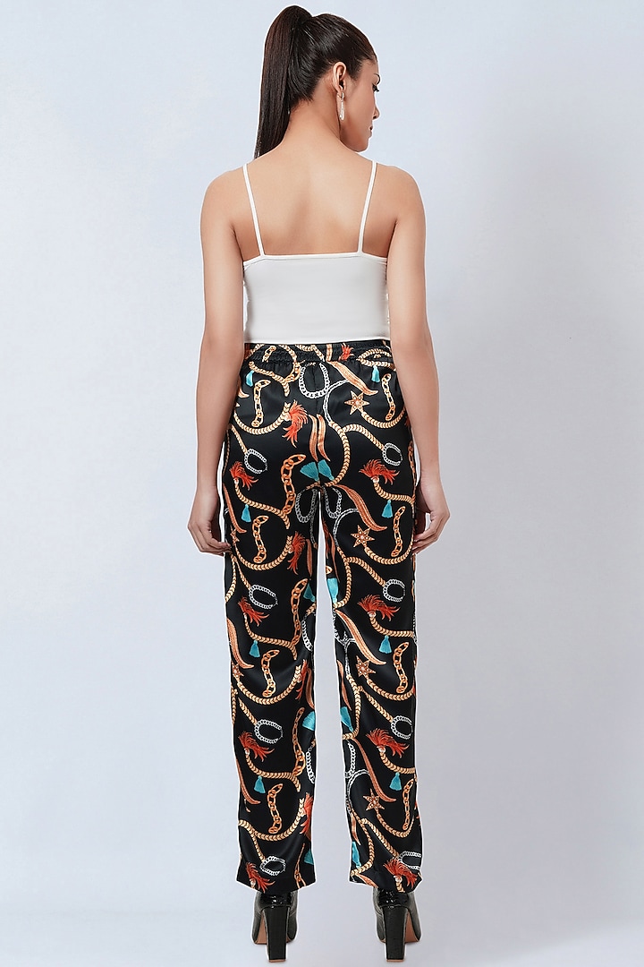 Black Polyester Satin Printed Palazzo Pants by First Resort by Ramola Bachchan at Pernia's Pop Up Shop