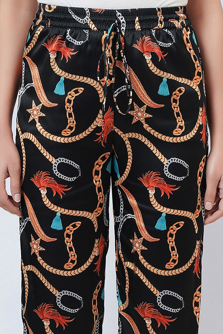 Black Polyester Satin Printed Palazzo Pants by First Resort by Ramola Bachchan at Pernia's Pop Up Shop
