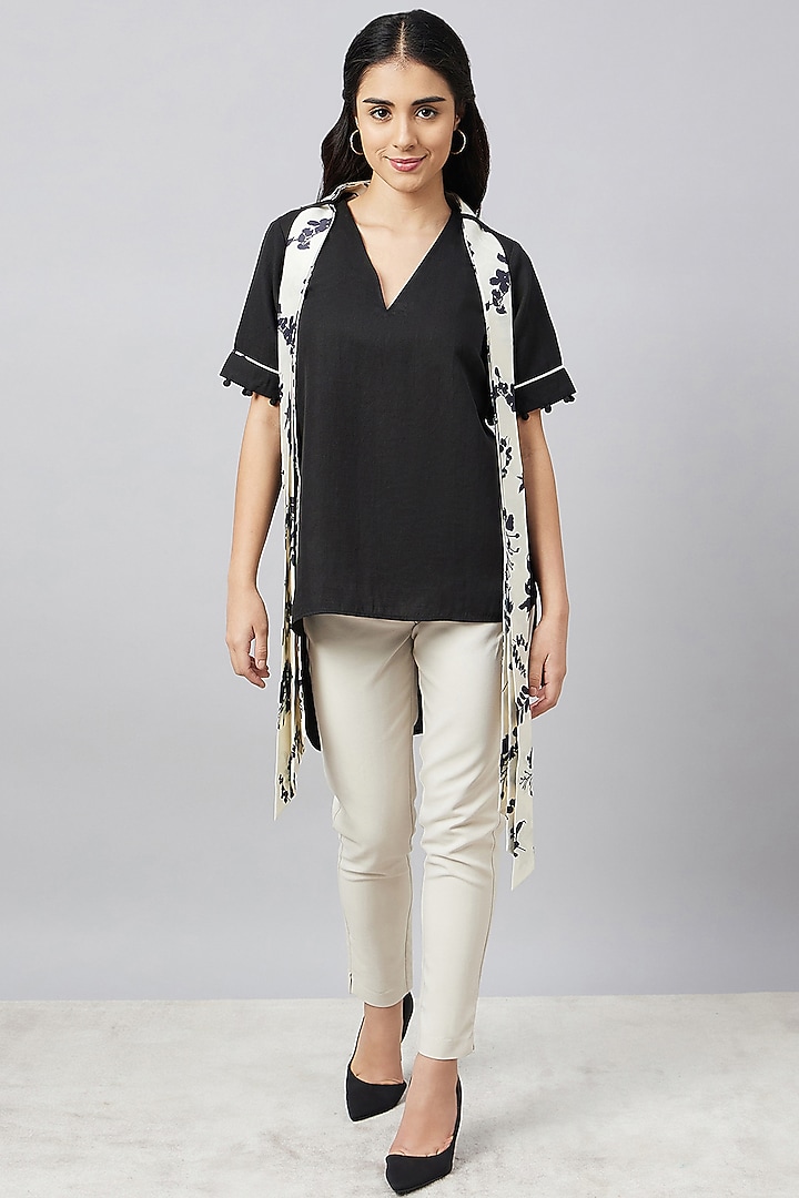 Black & Ivory Linen Floral Printed Top With Belt by First Resort by Ramola Bachchan at Pernia's Pop Up Shop