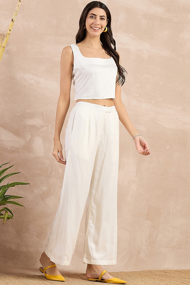 White Herringbone Flared Pants by First Resort by Ramola Bachchan at Pernia's Pop Up Shop