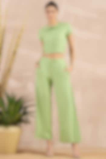 Mint Green Herringbone Flared Pants by First Resort by Ramola Bachchan at Pernia's Pop Up Shop