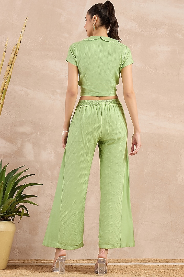 Mint Green Herringbone Flared Pants by First Resort by Ramola Bachchan at Pernia's Pop Up Shop