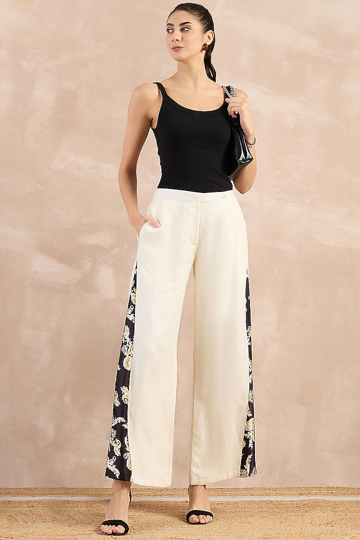 White Satin Printed Flared Pants by First Resort by Ramola Bachchan at Pernia's Pop Up Shop