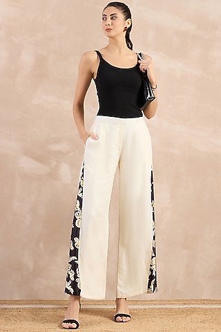 White Satin Printed Flared Pants by First Resort by Ramola Bachchan