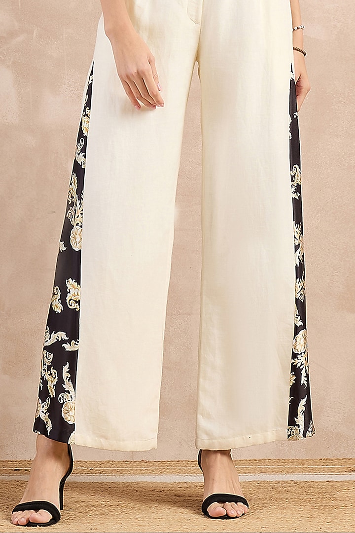 White Satin Printed Flared Pants by First Resort by Ramola Bachchan at Pernia's Pop Up Shop