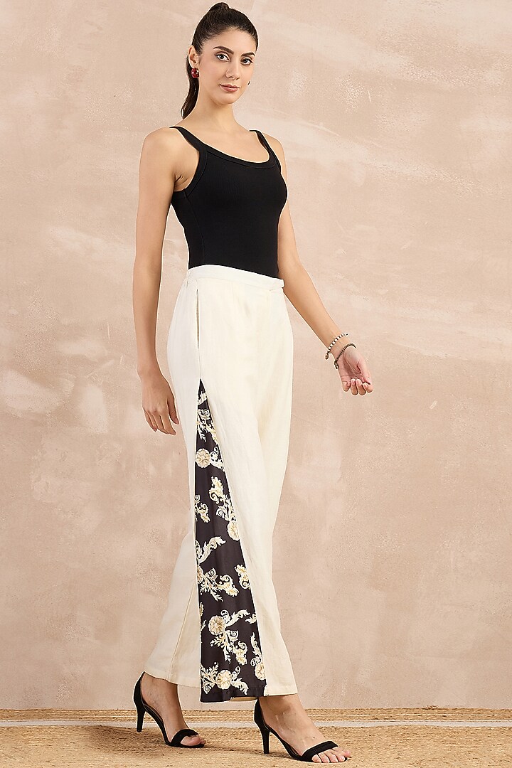 White Satin Printed Flared Pants by First Resort by Ramola Bachchan at Pernia's Pop Up Shop
