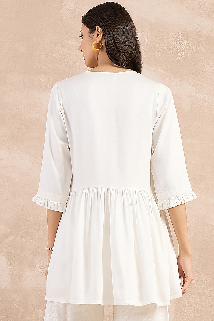 White Herringbone Frilled Peplum Top by First Resort by Ramola Bachchan at Pernia's Pop Up Shop