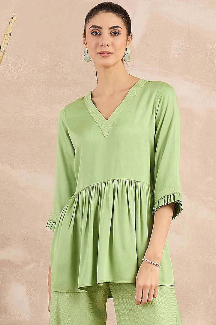 Mint Green Herringbone Frilled Peplum Top by First Resort by Ramola Bachchan at Pernia's Pop Up Shop