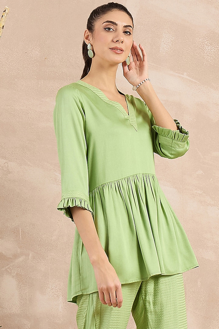 Mint Green Herringbone Frilled Peplum Top by First Resort by Ramola Bachchan at Pernia's Pop Up Shop