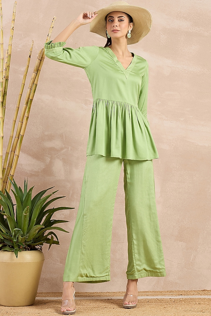 Mint Green Herringbone Frilled Peplum Top by First Resort by Ramola Bachchan at Pernia's Pop Up Shop