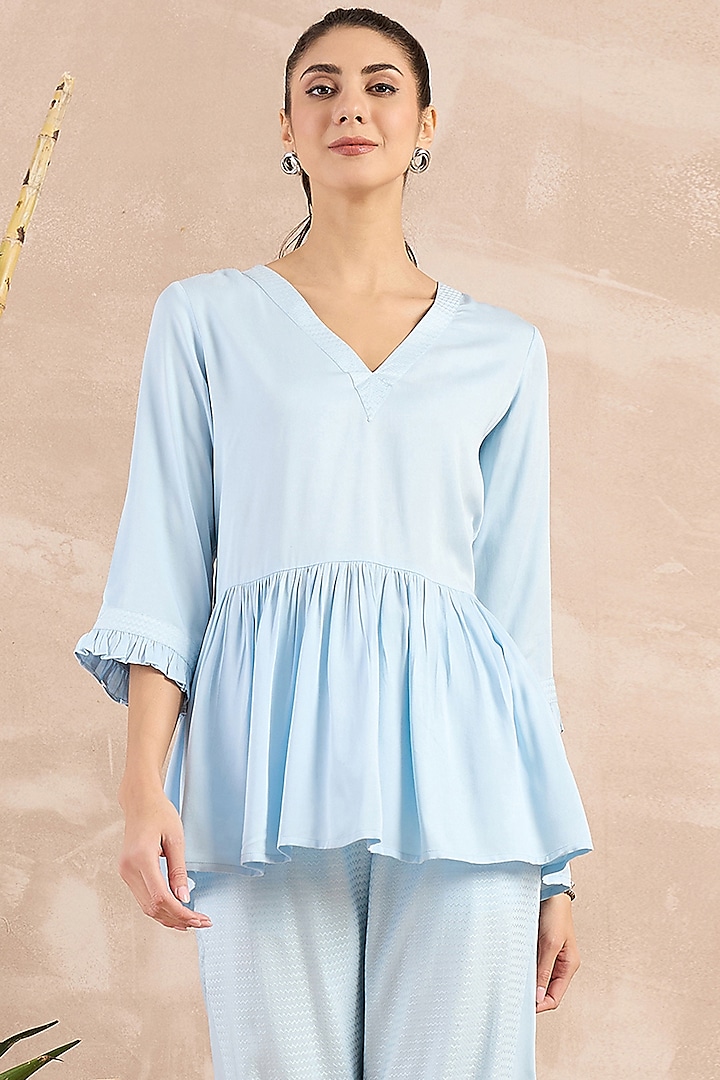 Sky Blue Herringbone Frilled Peplum Top by First Resort by Ramola Bachchan at Pernia's Pop Up Shop