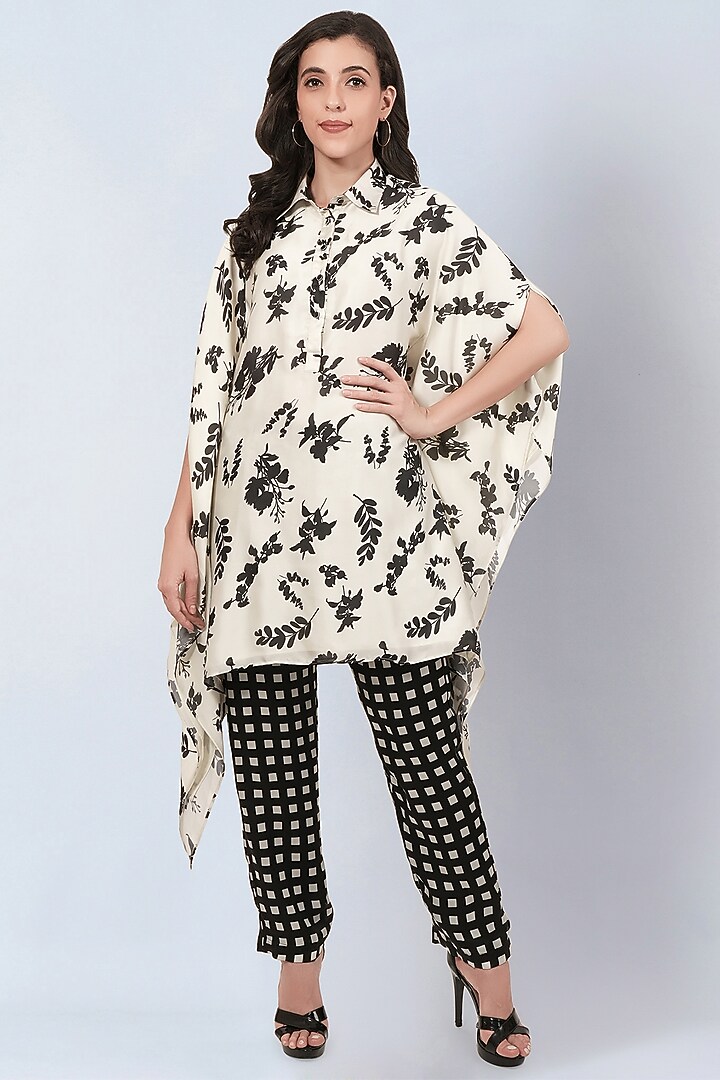 Ivory & Black Satin Georgette Floral Printed Tunic Set by First Resort by Ramola Bachchan at Pernia's Pop Up Shop