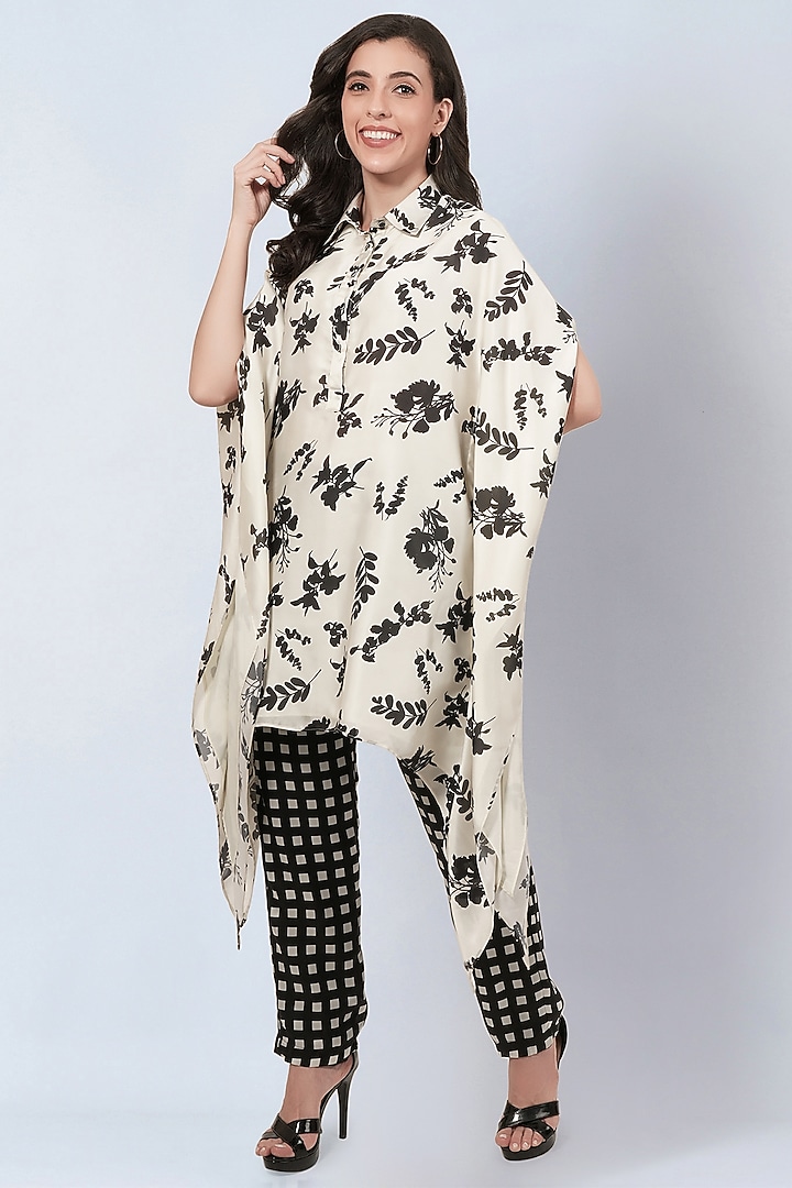Ivory & Black Satin Georgette Floral Printed Tunic Set by First Resort by Ramola Bachchan at Pernia's Pop Up Shop