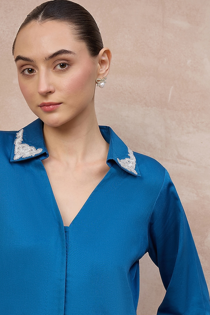 Blue Cotton Satin Baroque Embroidered Top by First Resort by Ramola Bachchan at Pernia's Pop Up Shop